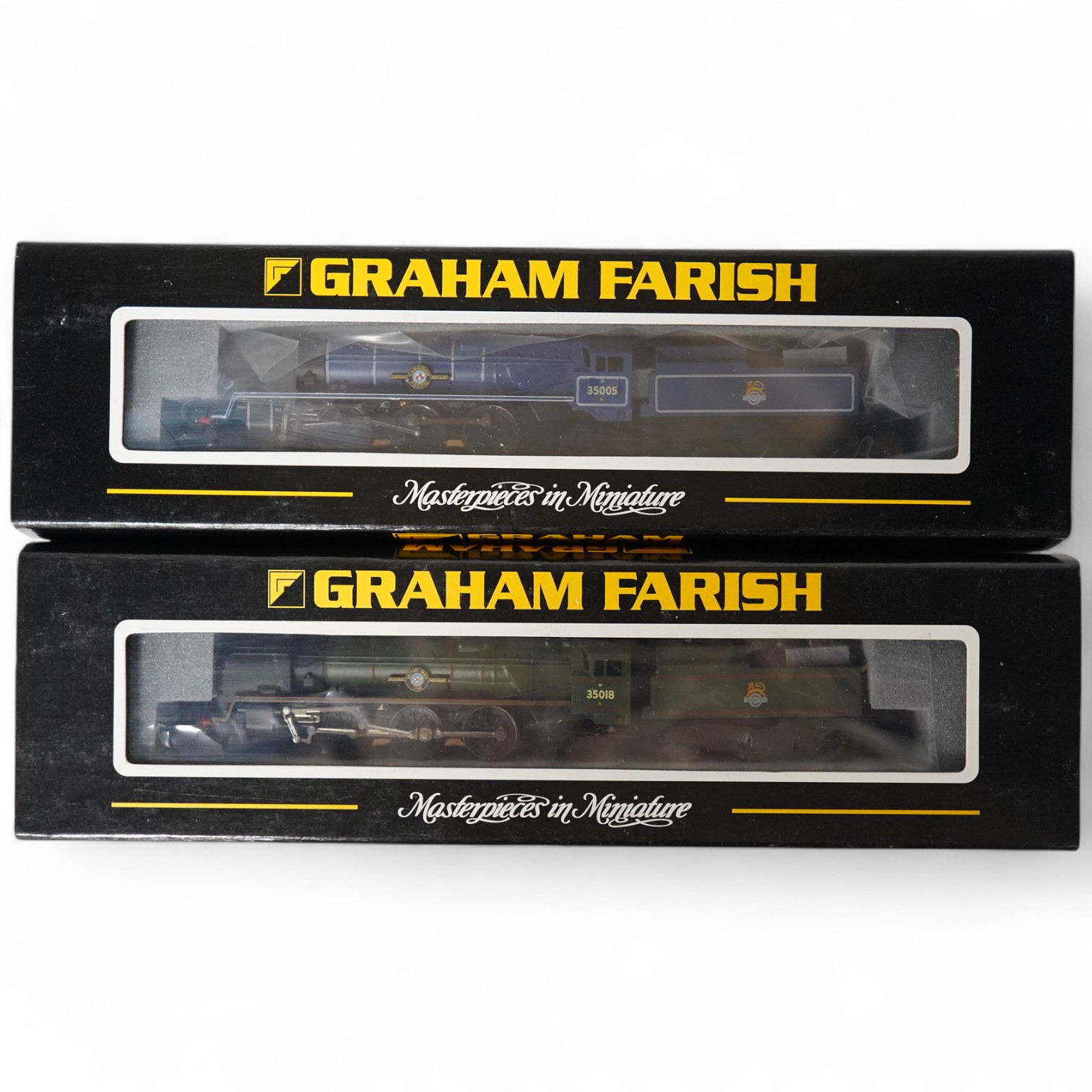 Two boxed Graham Farish N gauge railway BR Merchant Navy Class locomotives; British India Line 35018 (372-300) and Canadian Pacific 35005 (372-301). Condition - good.